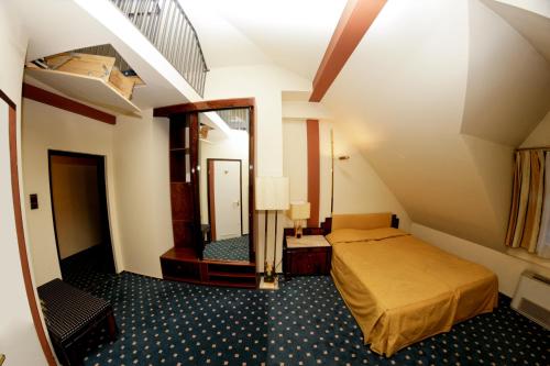Imagen de la habitación del Hotel Podzamcze. Foto 7