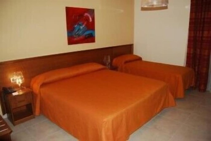 Imagen de la habitación del Hotel Poma. Foto 16