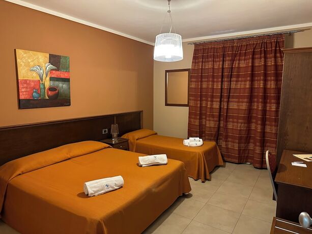 Imagen de la habitación del Hotel Poma. Foto 19