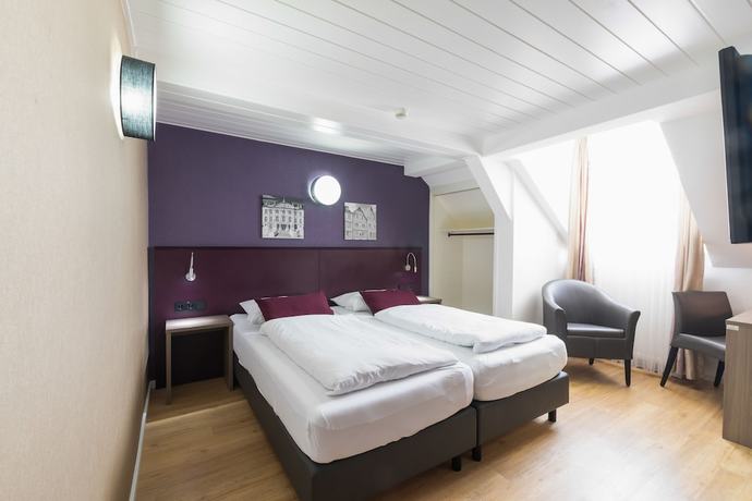 Imagen de la habitación del Hotel Porta Nigra. Foto 3