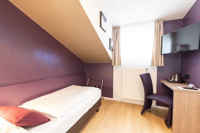 Imagen de la habitación del Hotel Porta Nigra. Foto 8