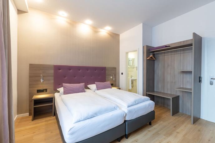 Imagen de la habitación del Hotel Porta Nigra. Foto 9