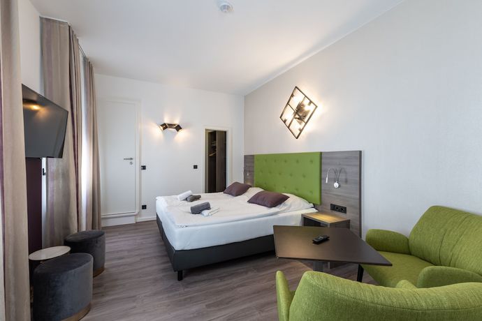 Imagen de la habitación del Hotel Porta Nigra. Foto 11