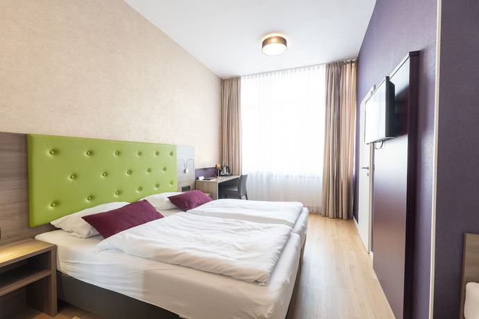 Imagen de la habitación del Hotel Porta Nigra. Foto 12