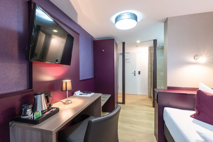 Imagen de la habitación del Hotel Porta Nigra. Foto 14