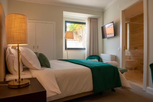 Imagen de la habitación del Hotel Portalegre Palace. Foto 2