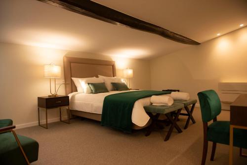 Imagen de la habitación del Hotel Portalegre Palace. Foto 5