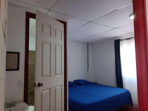 Imagen de la habitación del Hotel Posada Los Faroles Atlixco. Foto 17