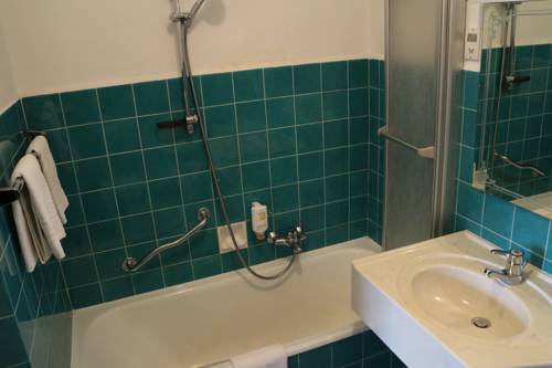 Imagen de la habitación del Hotel Post Karlon. Foto 10