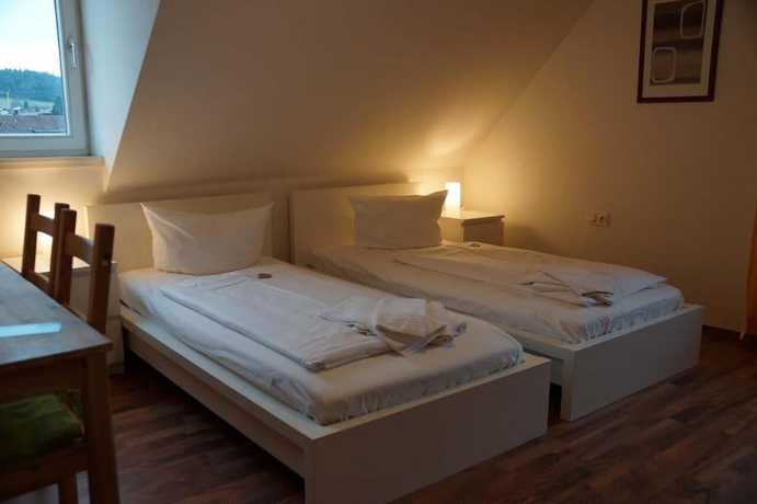 Imagen de la habitación del Hotel Postbauer Heng. Foto 11