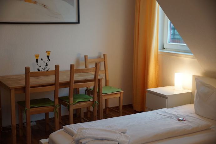 Imagen de la habitación del Hotel Postbauer Heng. Foto 15
