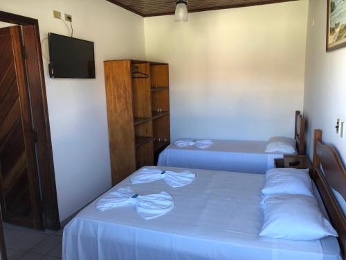 Imagen de la habitación del Hotel Pousada Nosso Cantinho. Foto 17