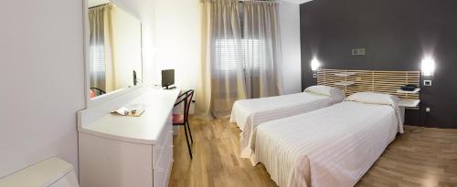 Imagen de la habitación del Hotel Quadrifoglio. Foto 6