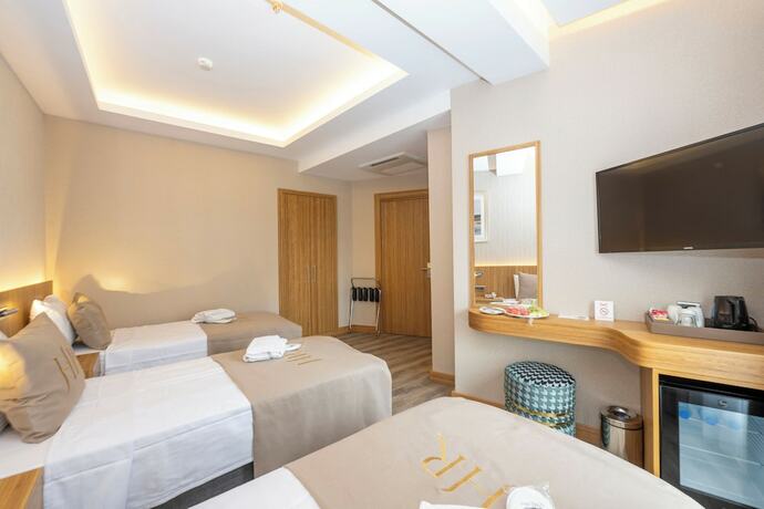 Imagen de la habitación del Hotel Ravi. Foto 17