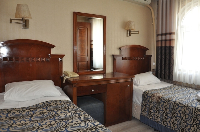 Imagen de la habitación del Hotel Red Rose. Foto 4