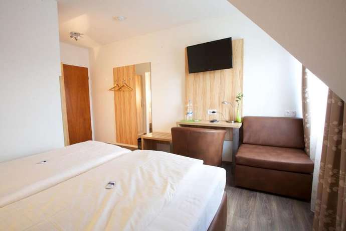 Imagen de la habitación del Hotel Reinhardtshof Garni. Foto 7