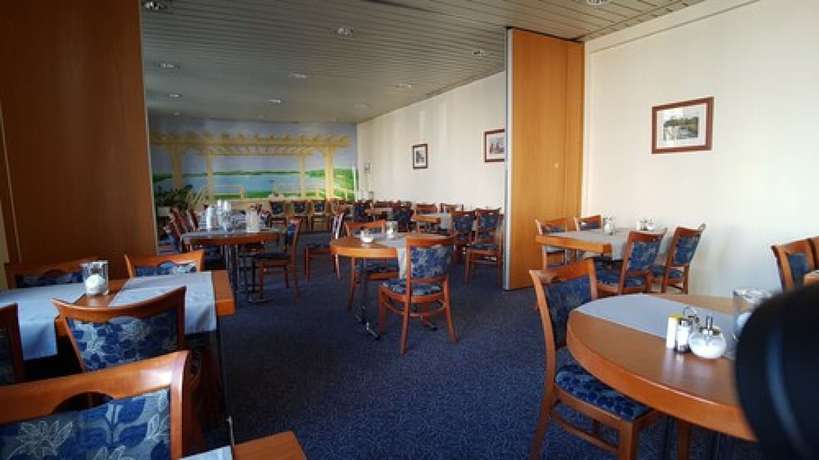 Imagen del bar/restaurante del Hotel Residence KG. Foto 5
