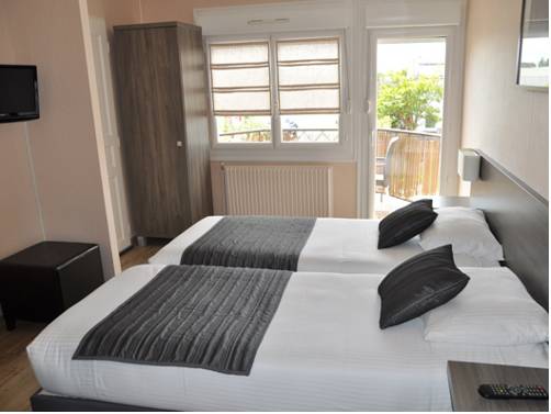 Imagen de la habitación del Hotel Residence La Baie Des Landes. Foto 9