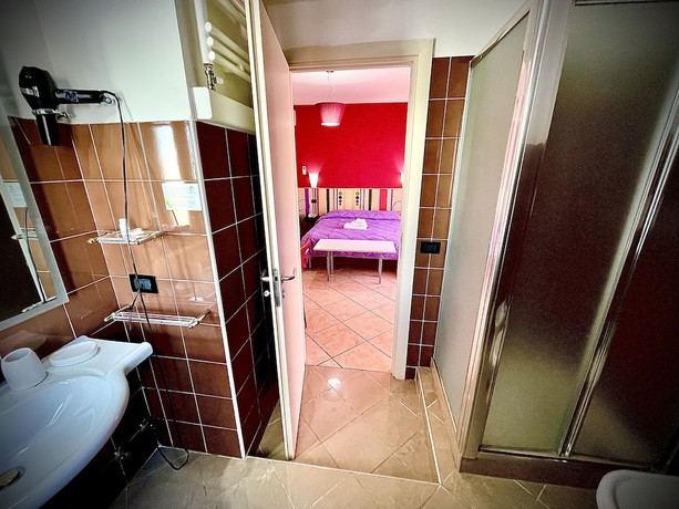 Imagen de la habitación del Hotel Residence Le Ceramiche. Foto 7