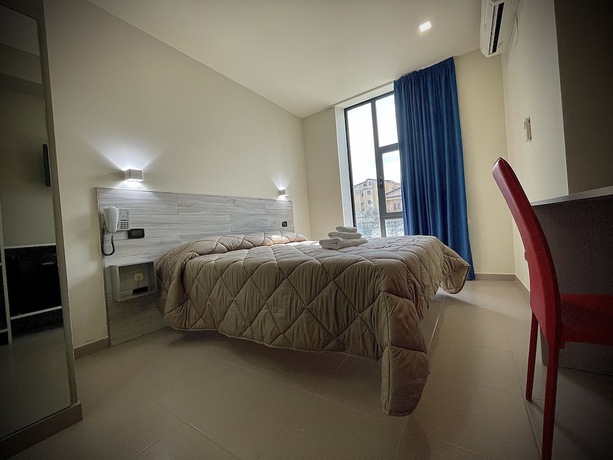 Imagen de la habitación del Hotel Residence Le Ceramiche. Foto 13