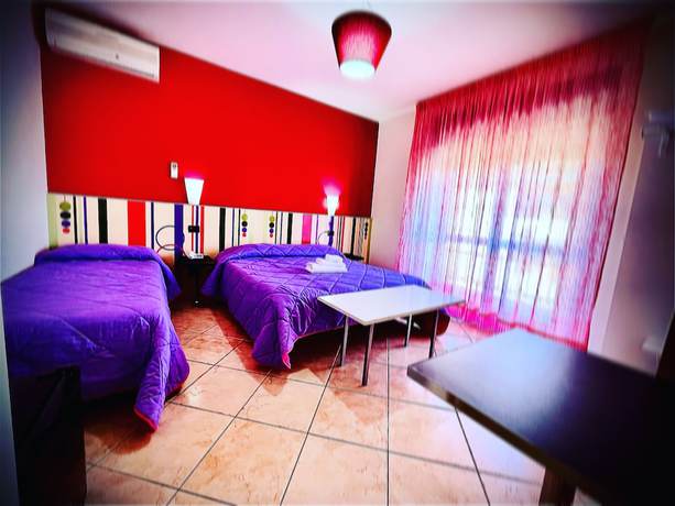 Imagen de la habitación del Hotel Residence Le Ceramiche. Foto 14