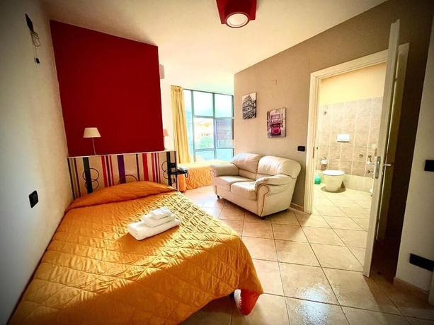 Imagen de la habitación del Hotel Residence Le Ceramiche. Foto 16