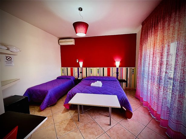 Imagen de la habitación del Hotel Residence Le Ceramiche. Foto 18