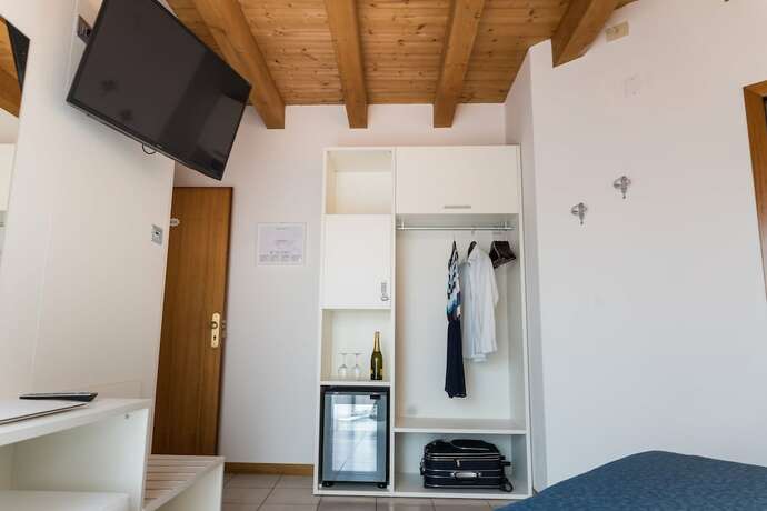 Imagen de la habitación del Hotel Residence Mara. Foto 16