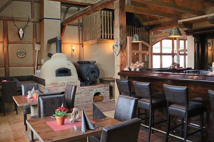 Imagen del bar/restaurante del Hotel Restaurant M&uuml;hlenhof Bosse. Foto 7