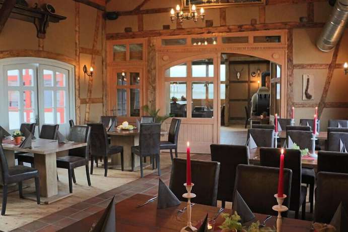 Imagen del bar/restaurante del Hotel Restaurant M&uuml;hlenhof Bosse. Foto 9