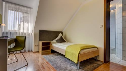 Imagen de la habitación del Hotel Restaurant Weihenstephaner Stuben. Foto 14