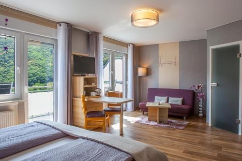 Imagen de la habitación del Hotel Restaurant Weingut Kapellenhof. Foto 10