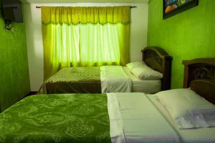 Imagen de la habitación del Hotel Restaurante El Madro&ntilde;o Chia. Foto 11