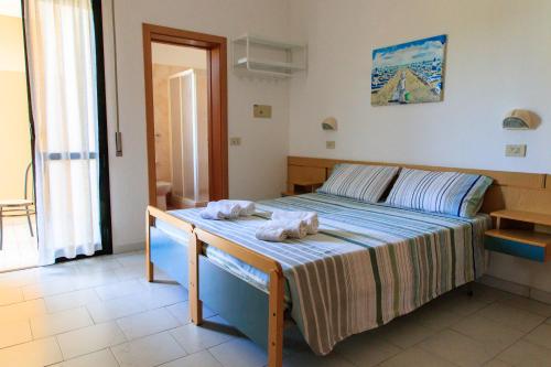 Imagen de la habitación del Hotel Riziana. Foto 4