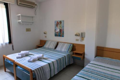 Imagen de la habitación del Hotel Riziana. Foto 6
