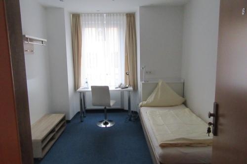 Imagen de la habitación del Hotel Rom&auml;us. Foto 9