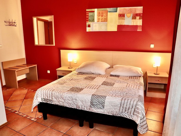 Imagen de la habitación del Hotel Romina. Foto 5