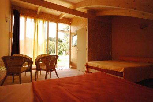 Imagen de la habitación del Hotel Rose, Beauvoir. Foto 14