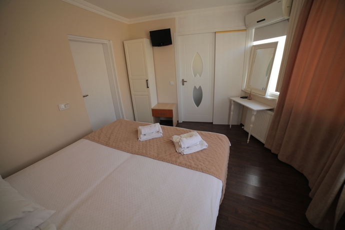 Imagen de la habitación del Hotel Rose Bouquets. Foto 7