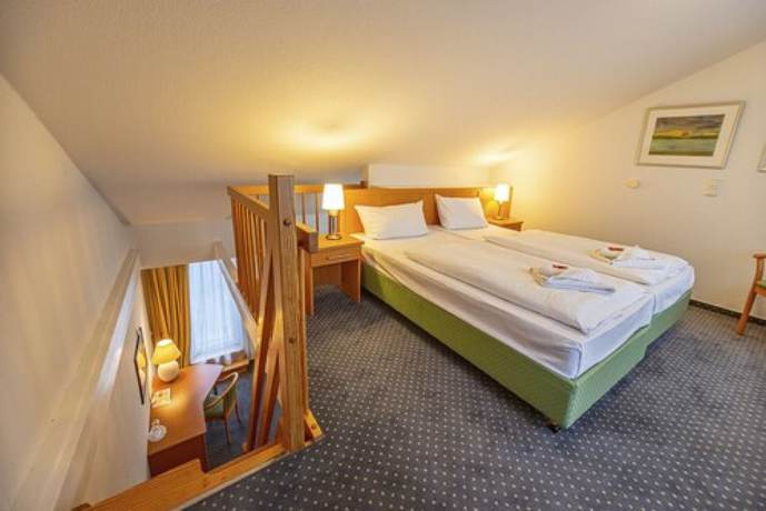 Imagen de la habitación del Hotel Rostock West im Kritzmow Park. Foto 7