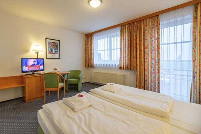 Imagen de la habitación del Hotel Rostock West im Kritzmow Park. Foto 8