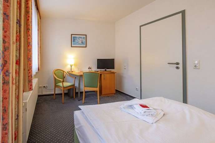 Imagen de la habitación del Hotel Rostock West im Kritzmow Park. Foto 15