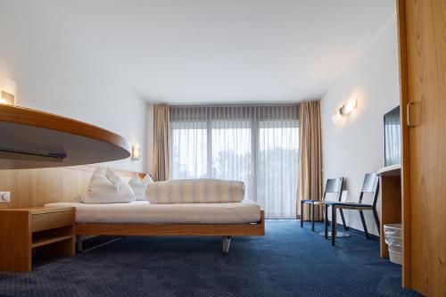 Imagen de la habitación del Hotel Rössli Tufertschwil. Foto 10