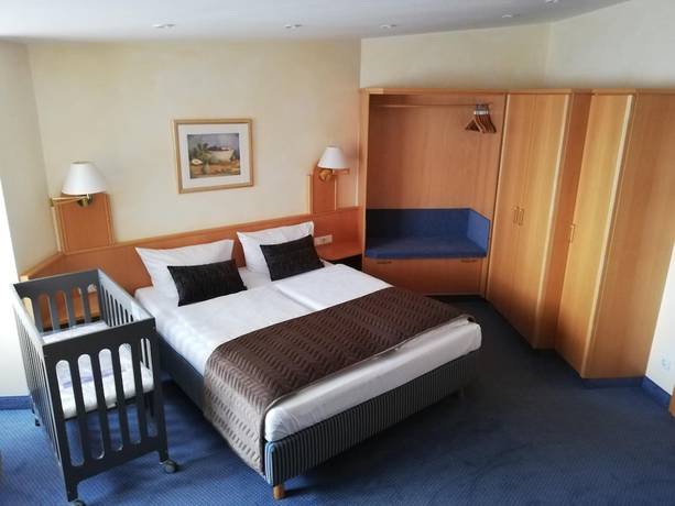 Imagen de la habitación del Hotel Russmann. Foto 13