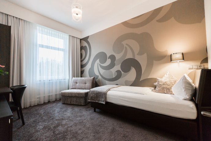 Imagen de la habitación del Hotel SONATA. Foto 11