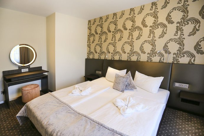 Imagen de la habitación del Hotel SONATA. Foto 18