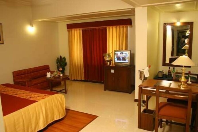 Imagen de la habitación del Hotel Sangat Regency. Foto 5