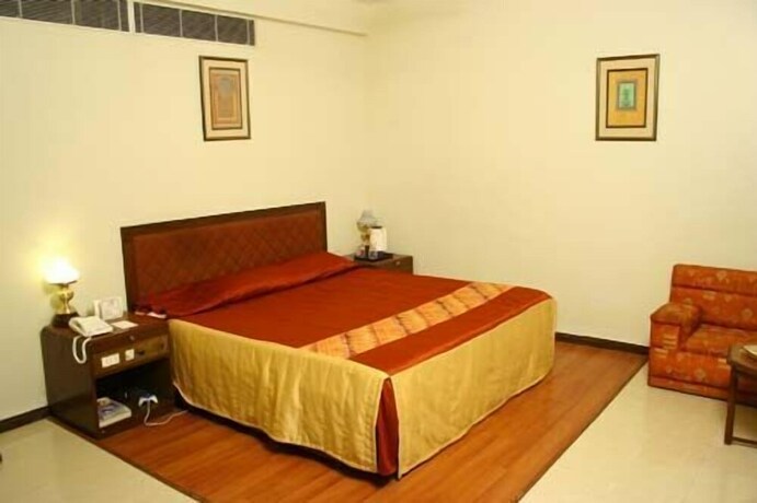 Imagen de la habitación del Hotel Sangat Regency. Foto 13