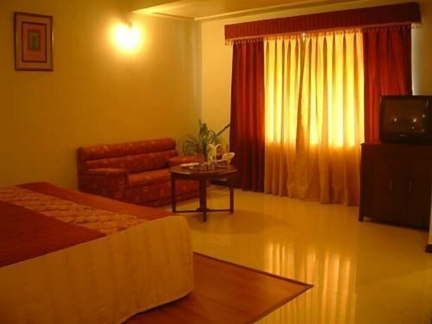 Imagen de la habitación del Hotel Sangat Regency. Foto 21