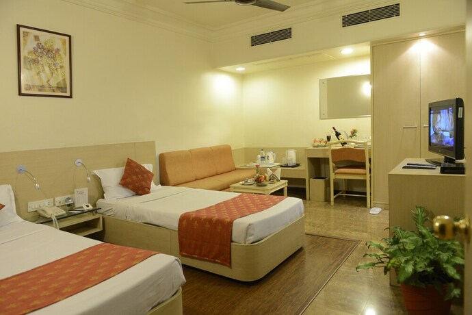 Imagen de la habitación del Hotel Sangat Regency. Foto 24